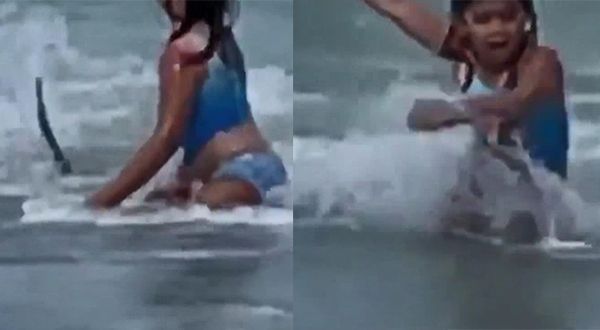 Havai’de denize giren çocuk köpek balığından böyle kaçtı