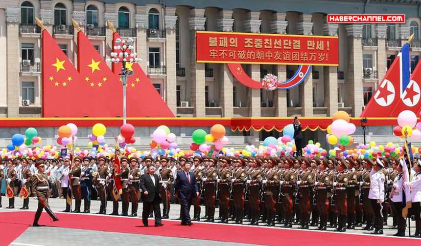 Çin Devlet Başkanı Xi Jinping, Kim Jong Un tarafından törenle karşılandı